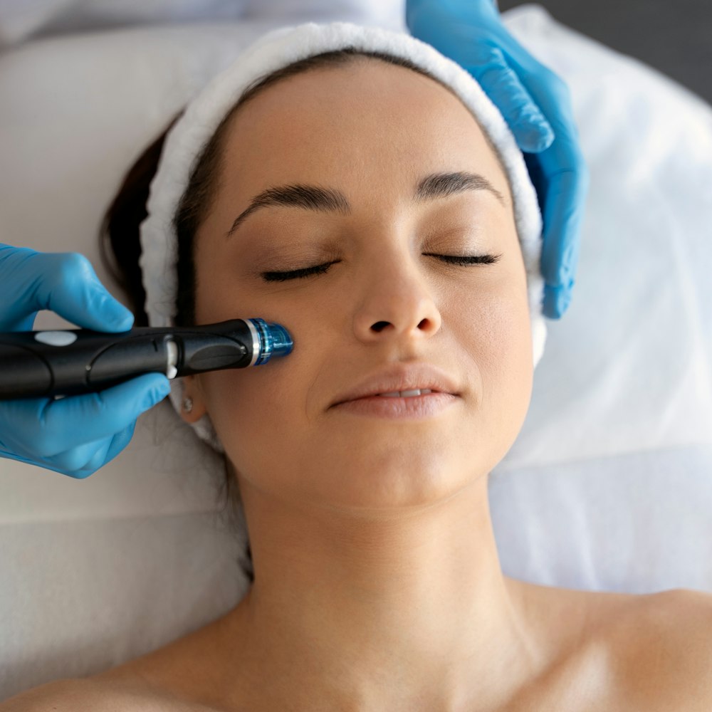 Woman getting a hydrafacial