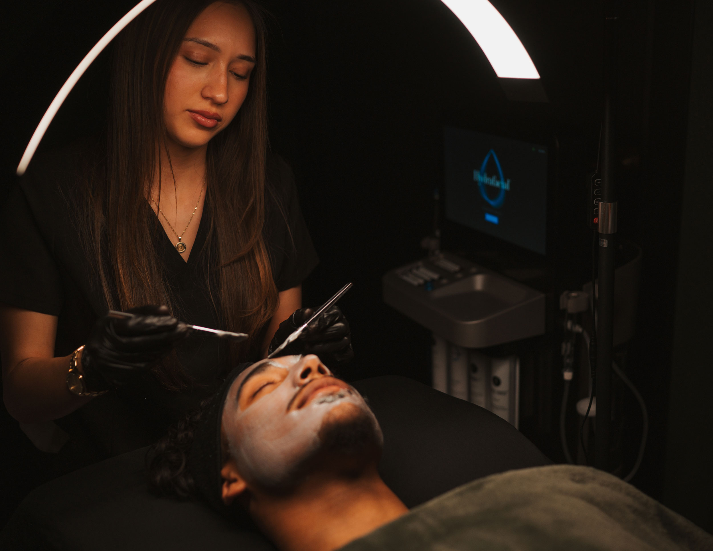 Man receiving facial treatment