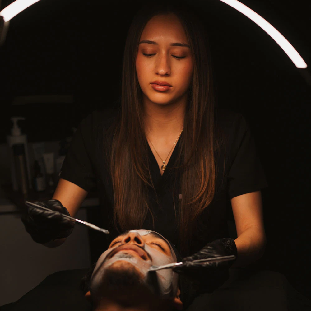 Medical Aesthetician performing chemical peel