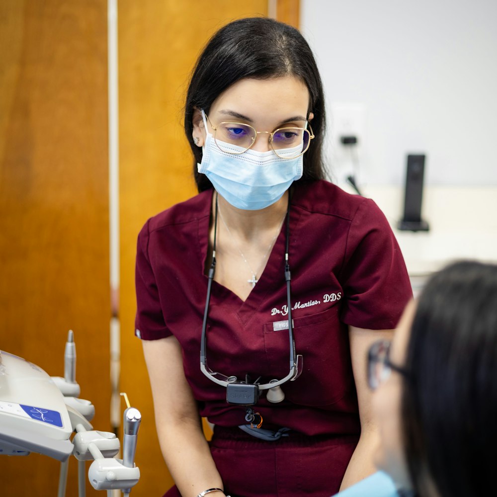 Dr. Youstina Mantias talking to a patient