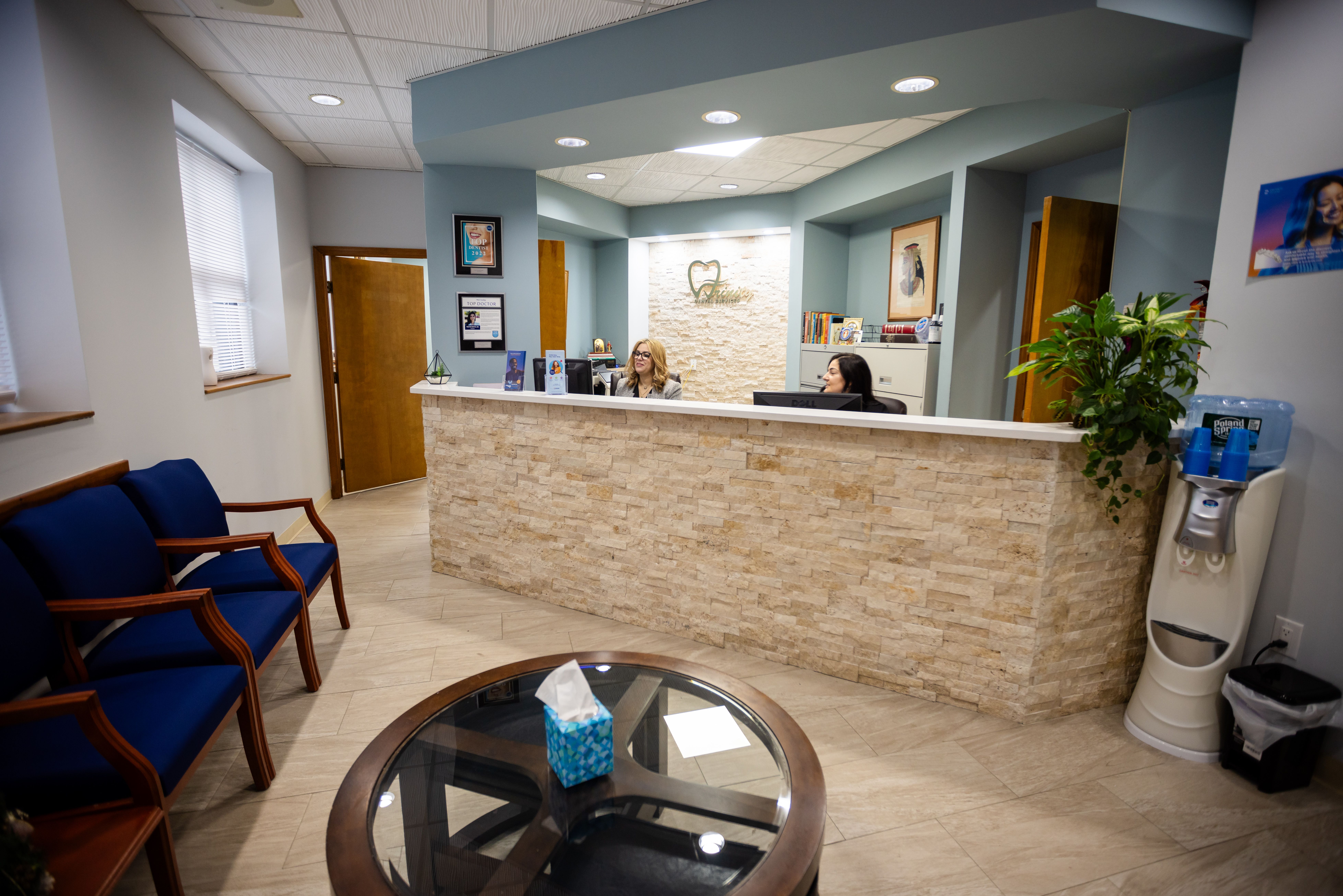 Trinity Dental Services welcome desk and comfy couches