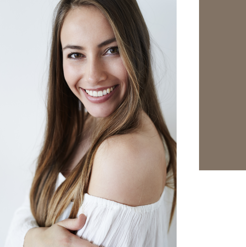 Smiling confident woman after a smile makeover