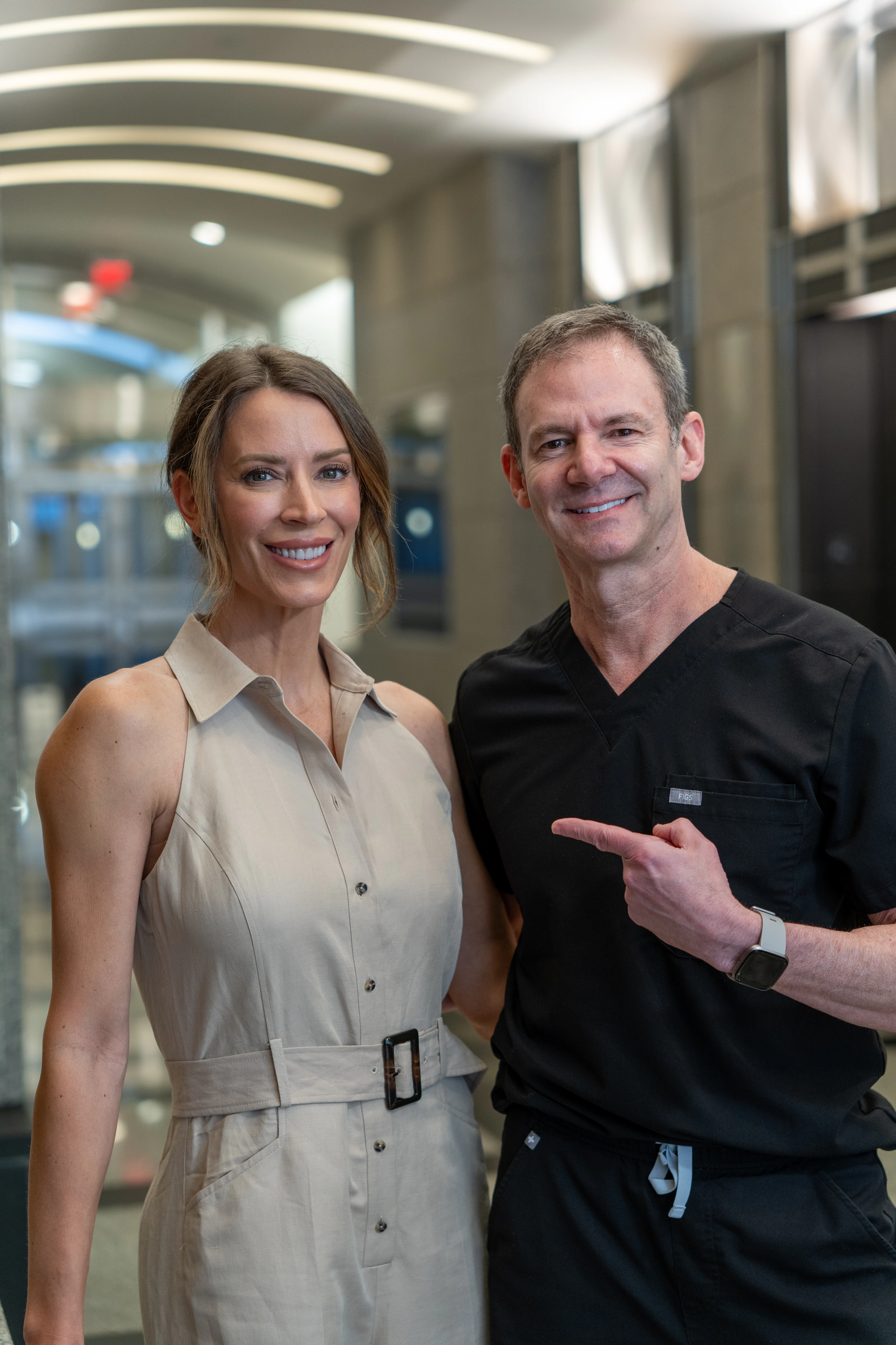 Real patient smiling with Dr. Myles