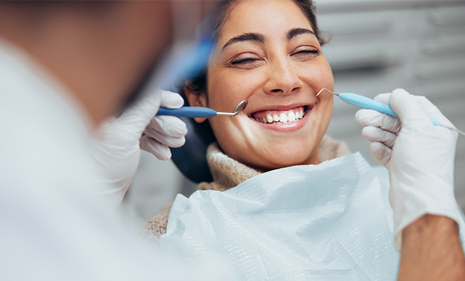 Happy smile makeover patient