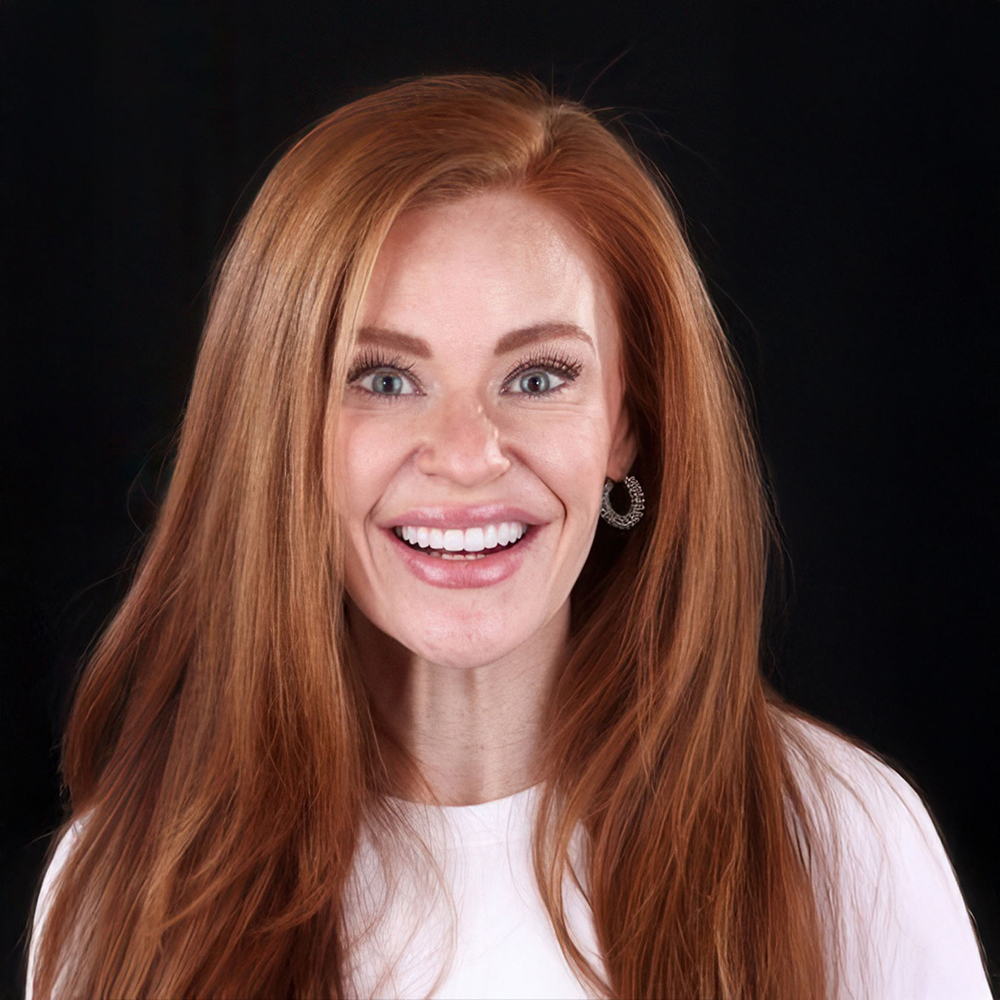 smiling woman with red hair