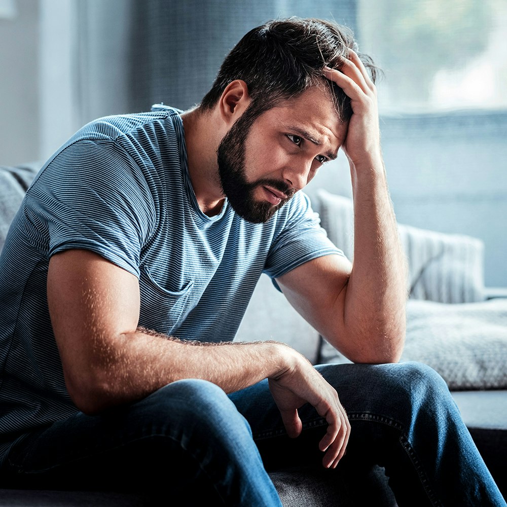 an upset looking man