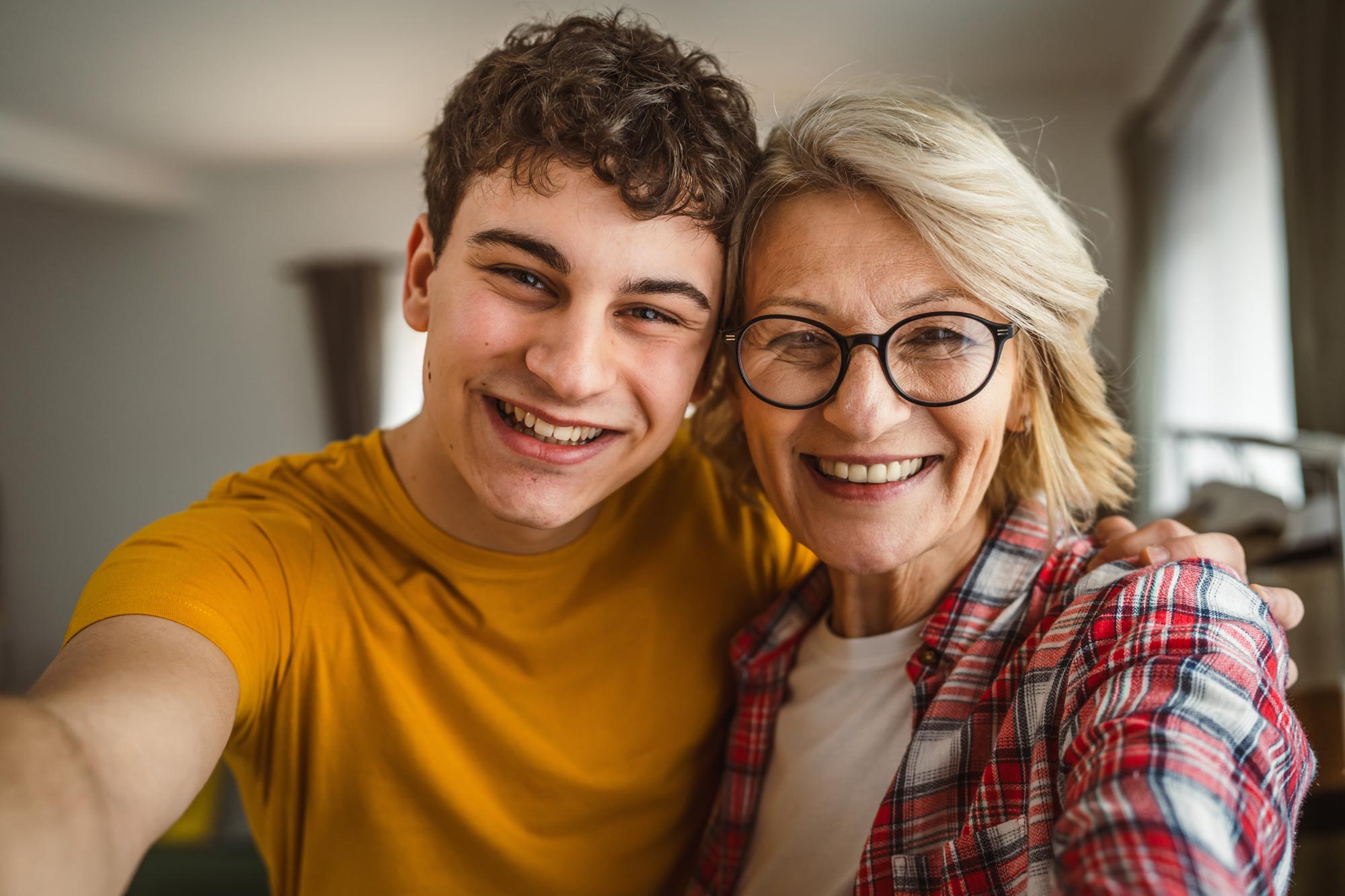 Boy smiling with his mother