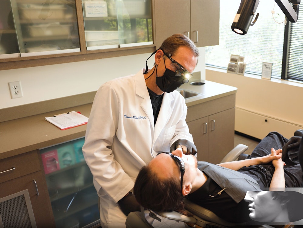 Dr. Reed examining a patient