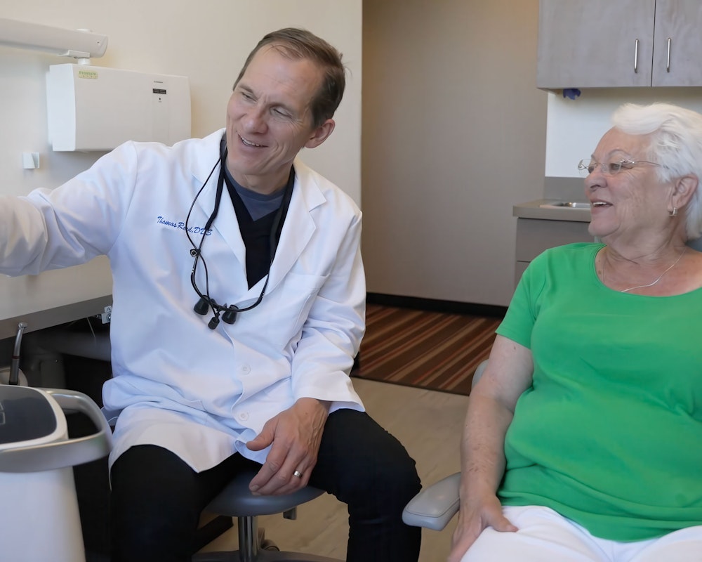 Dr. Thomas Reed and real patient during appointment