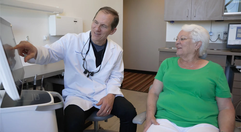 Dr. Thomas Reed and real patient during appointment