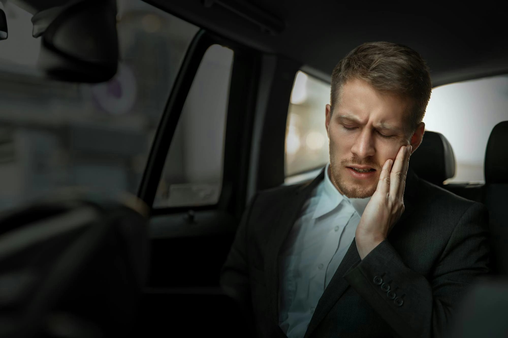 Young man with tooth pain