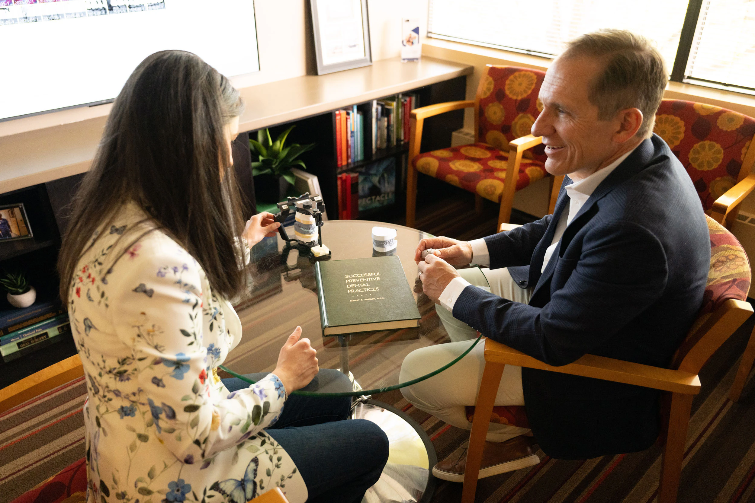Dr. Reed consults a colleague