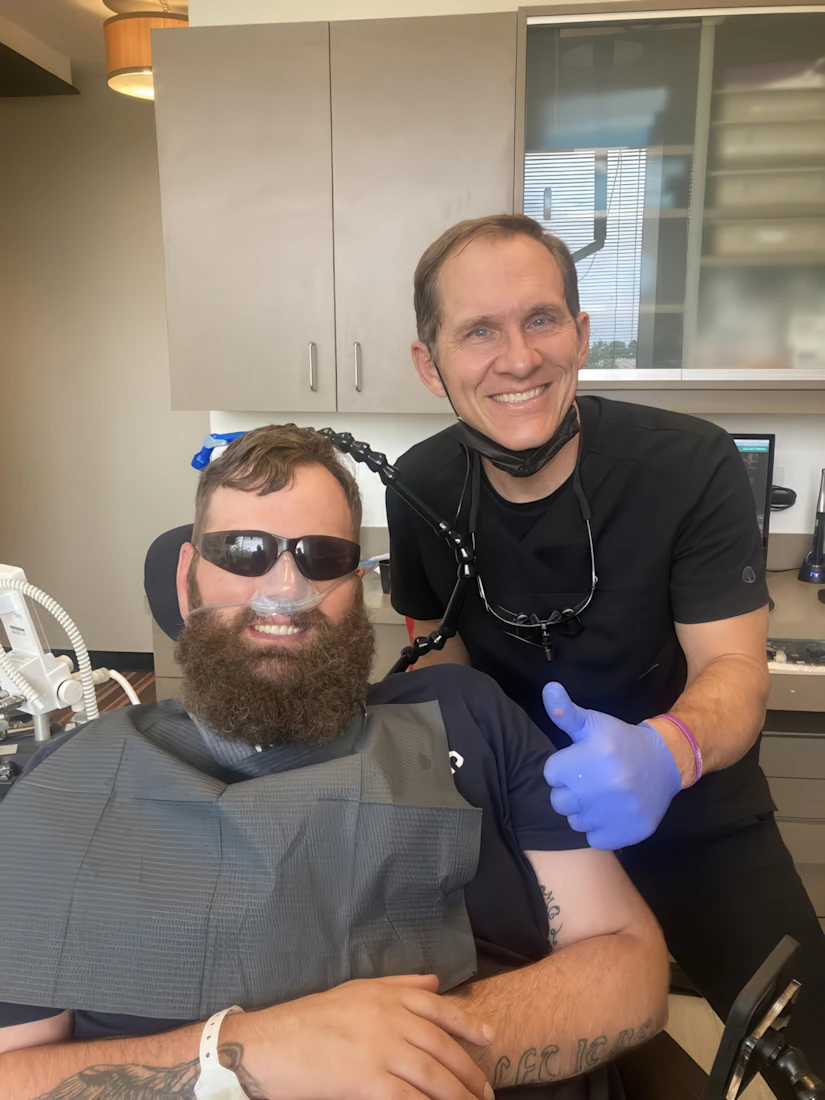 Dr. Reed with a patient wearing nitrous oxide mask