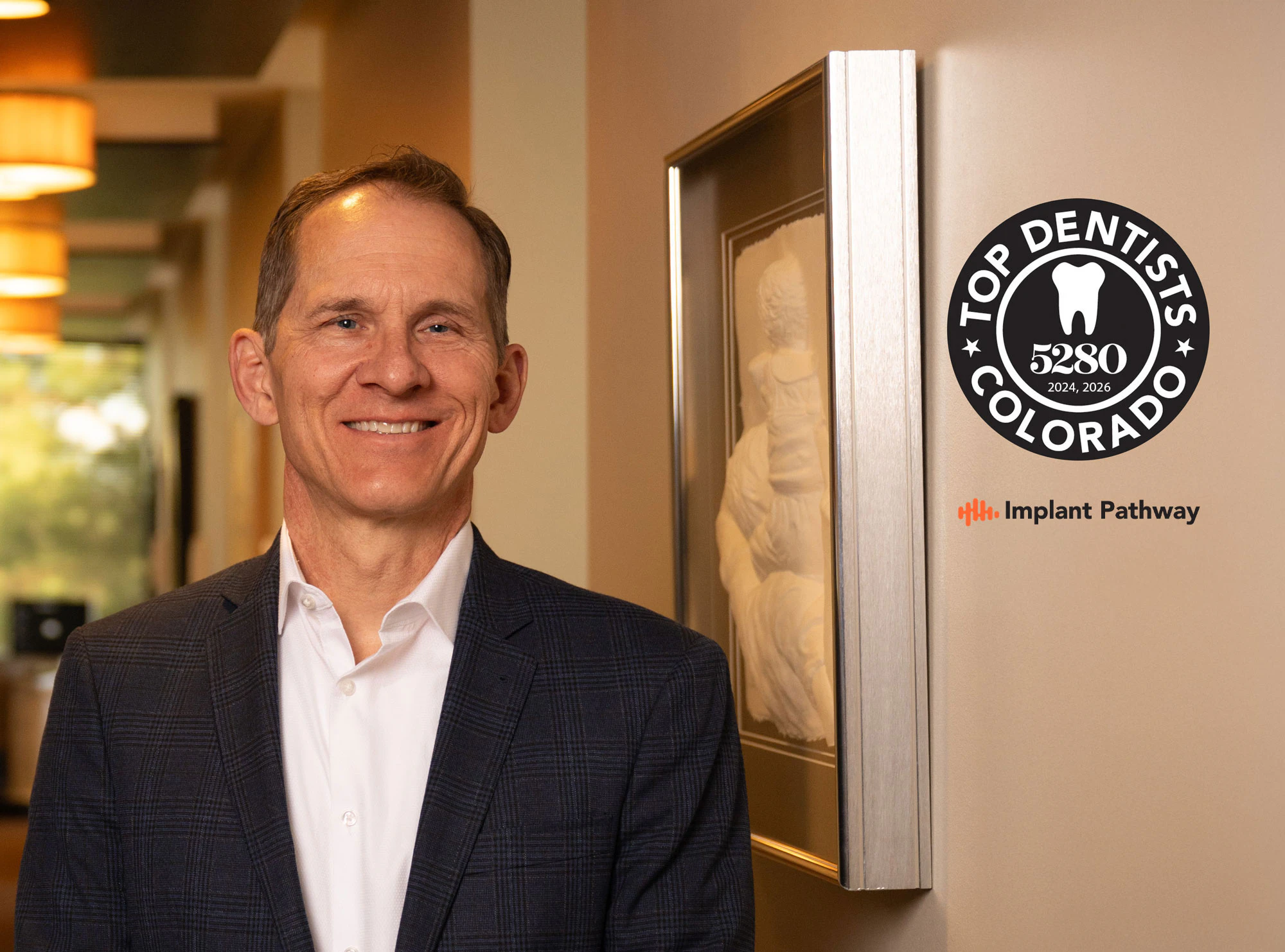 Dr. Thomas Reed with Top Dentists Colorado 5280 2024, 2026 award and Implant Pathway affiliation