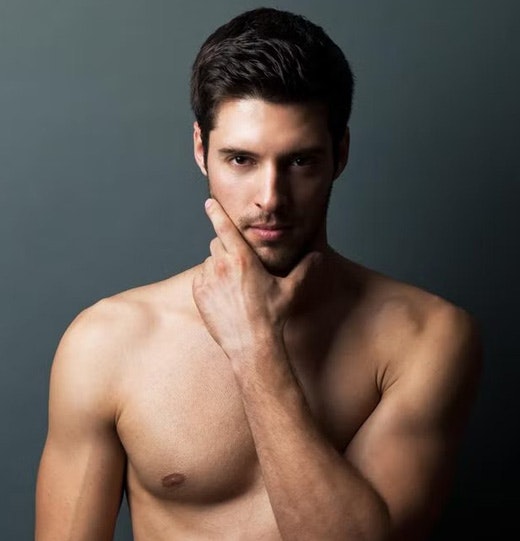 Attractive man after gynecomastia surgery