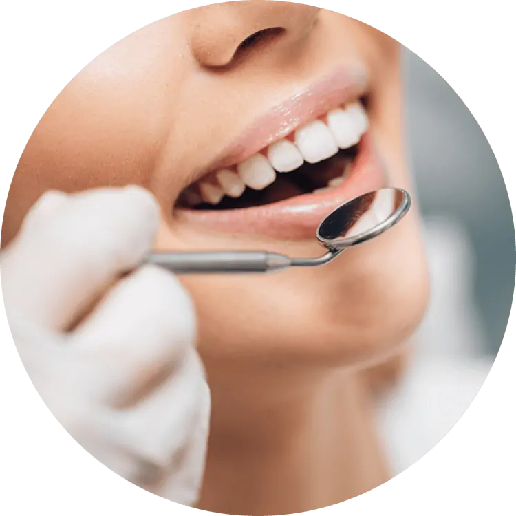 image of woman smiling with dental tool