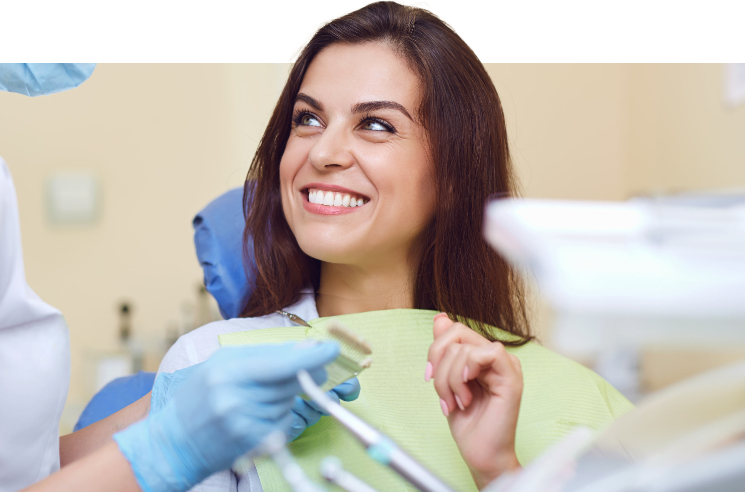 Smiling woman in the dental chair