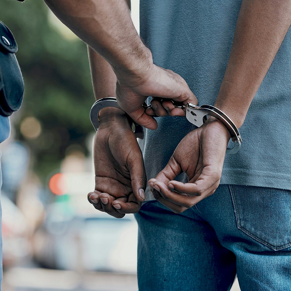 Arizon man in handcuffs