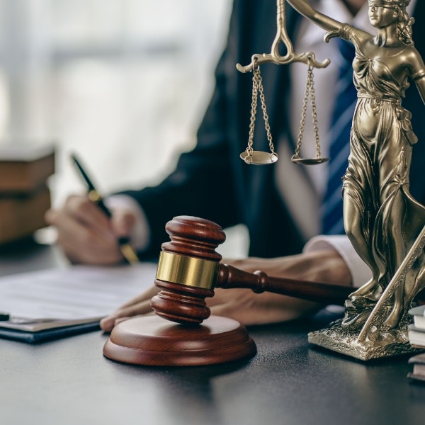 Lawyer sitting behind gavel