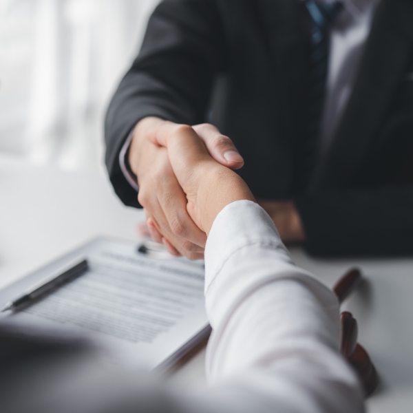 Tucson lawyer and client shaking hands