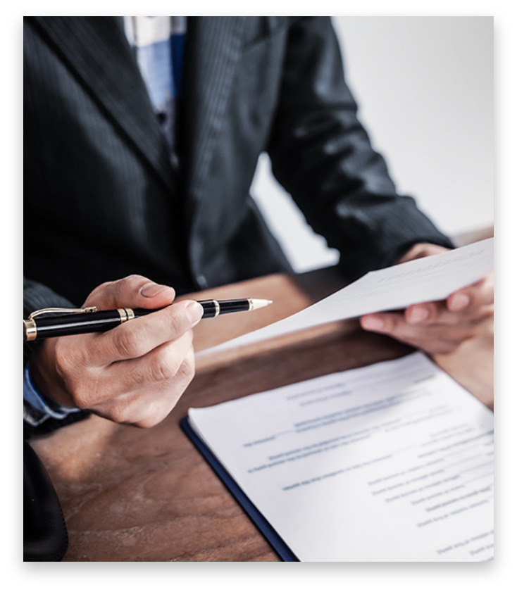 Tucson felony attorney reviewing paperwork