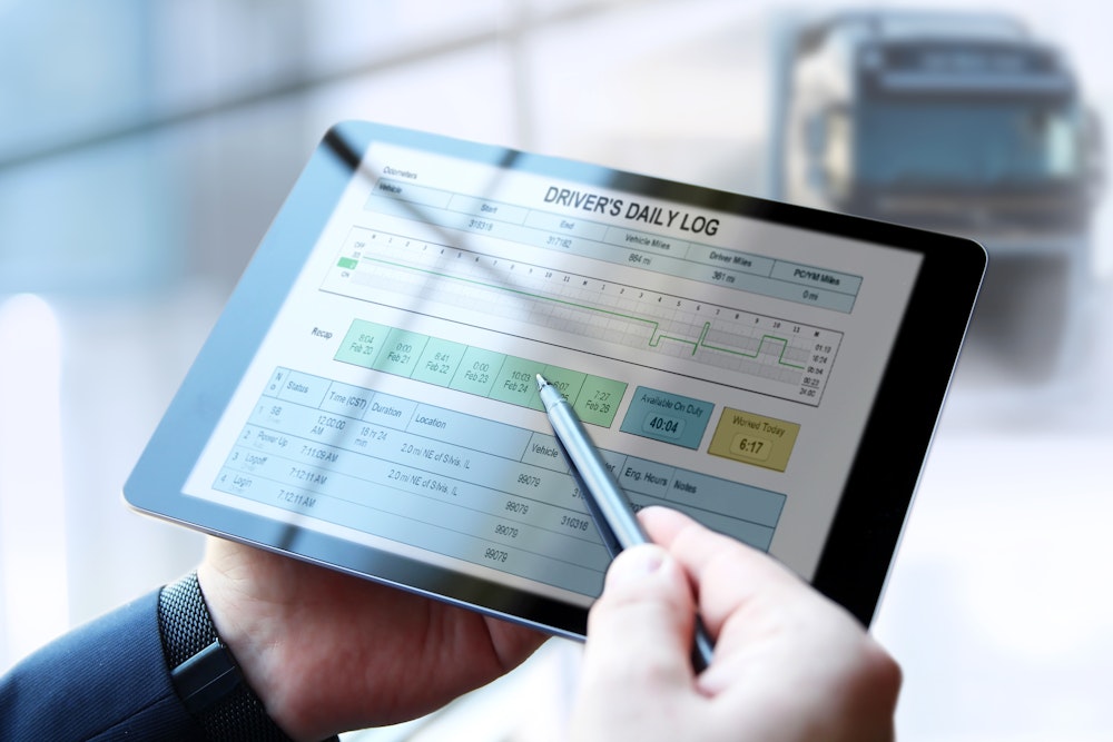 driver logging their time on the road