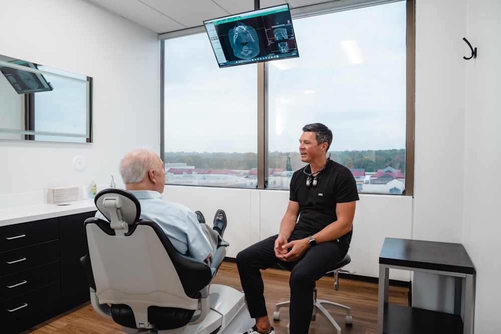 Dr. Hill in consultation with patient