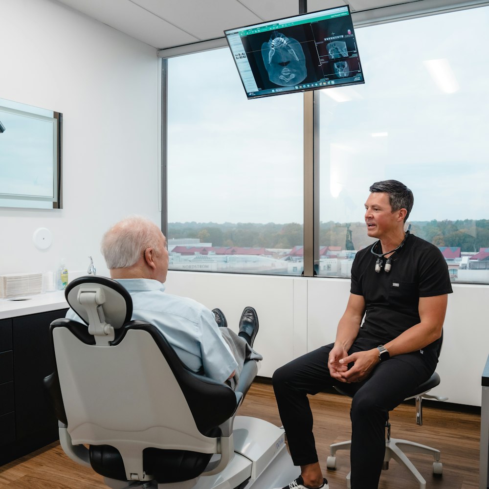 Dr. Hill in consultation with patient