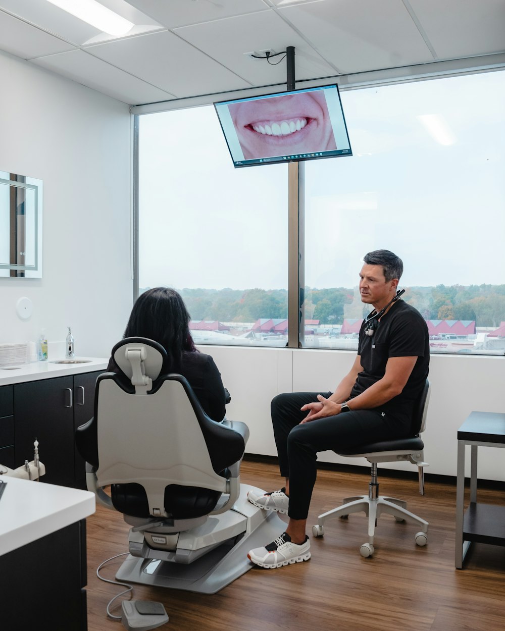 Dr. Hill meeting with a patient