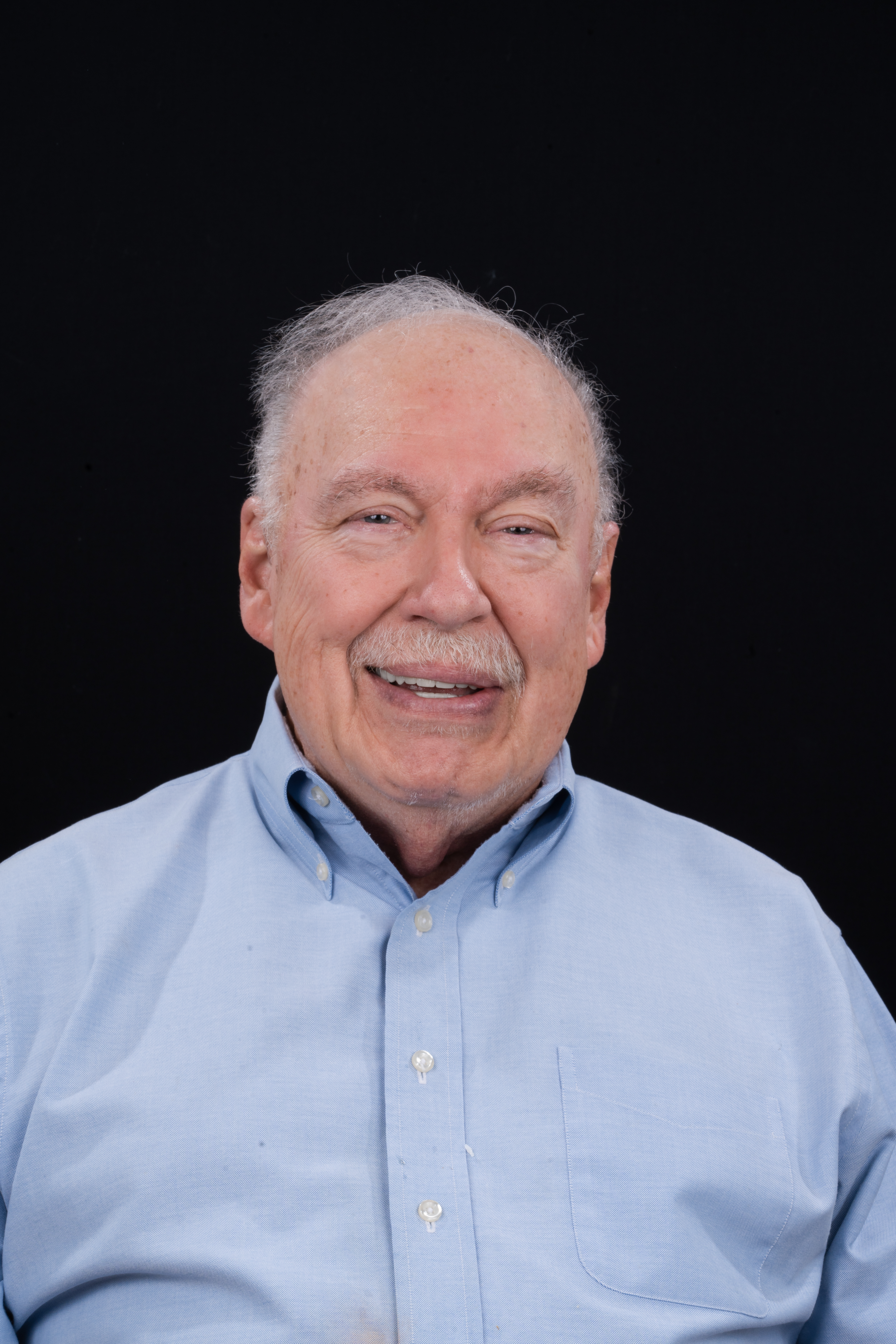 Man smiling with new Dentures