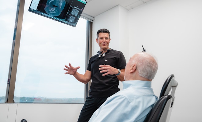 dentist explaining care