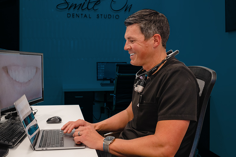 Dental patient watching her virtual consultation video