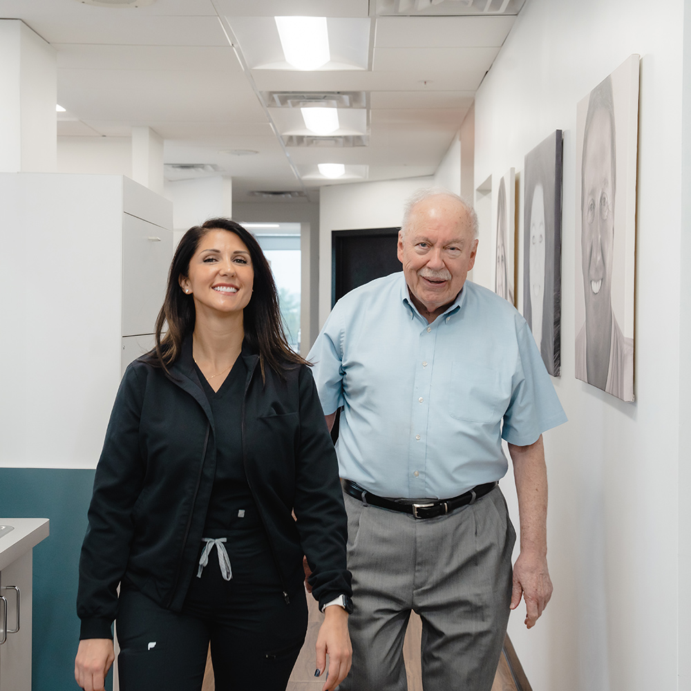 Patient walking with a dentist