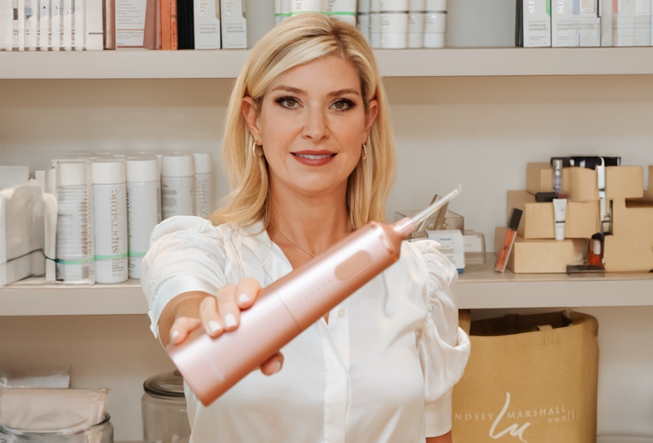 Dr. Lindsey Marshall with the Suresmile device