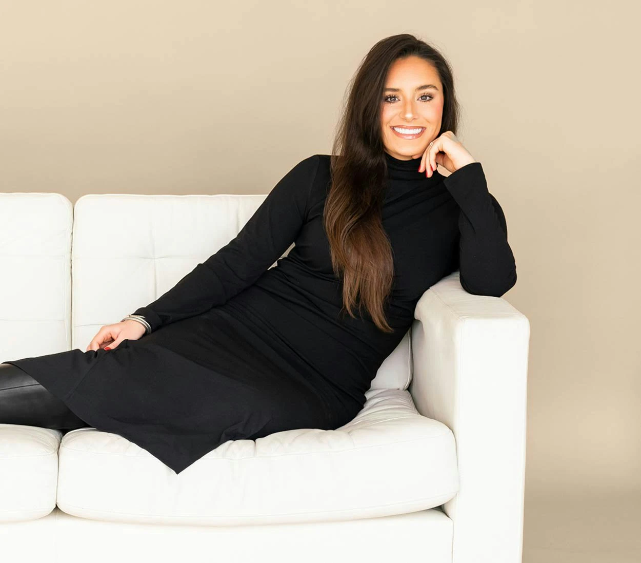 woman smiling on couch