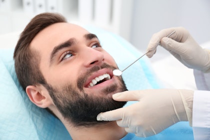 Man receiving dental treatment