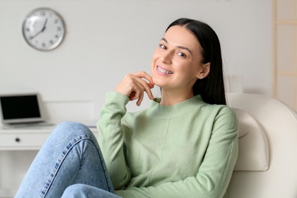 Woman smiling with braces