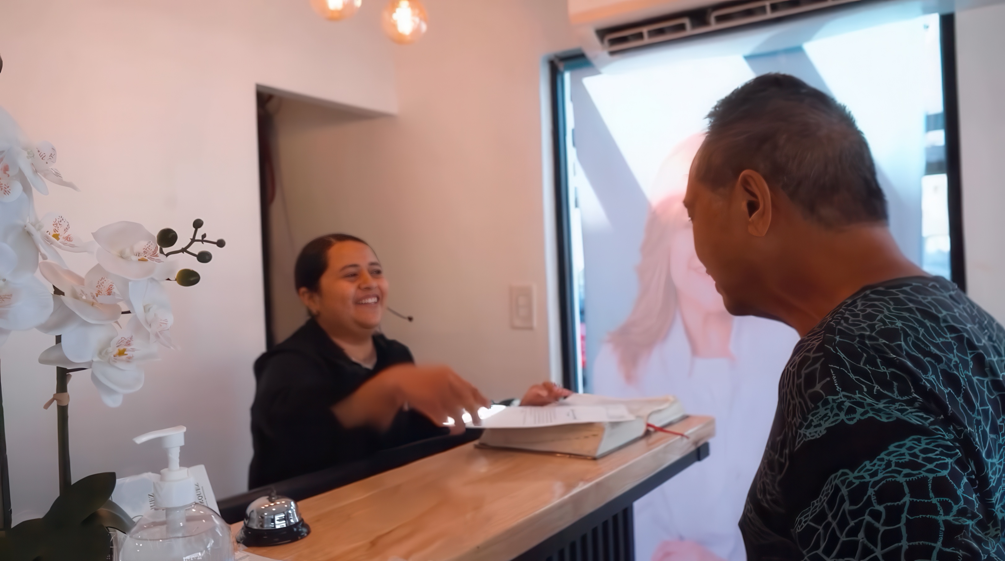 Patient checking in at front desk