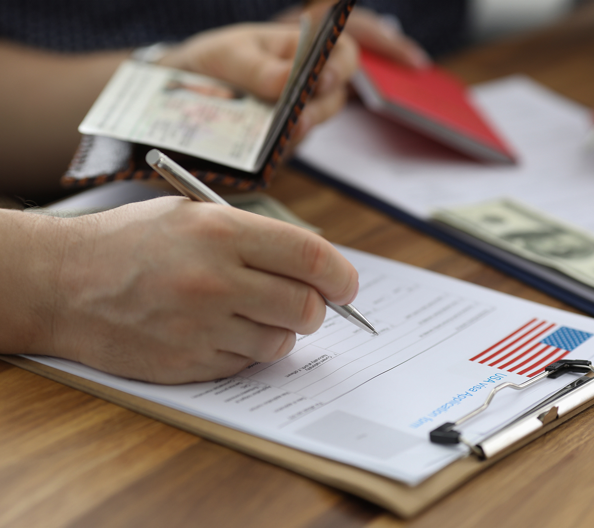 Person filling out DACA paperwork