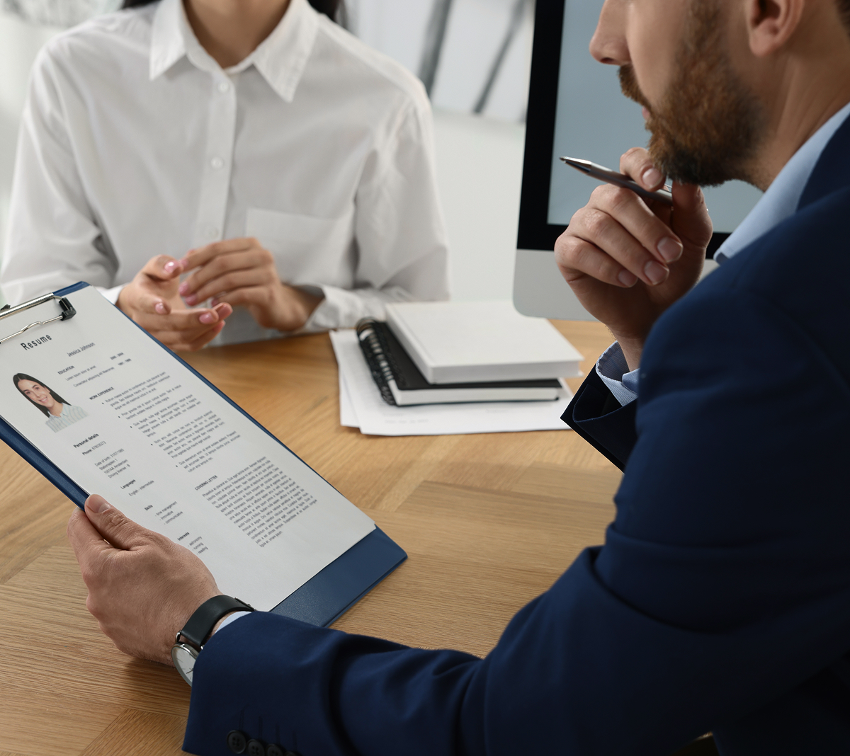 Attorney & client looking over paperwork