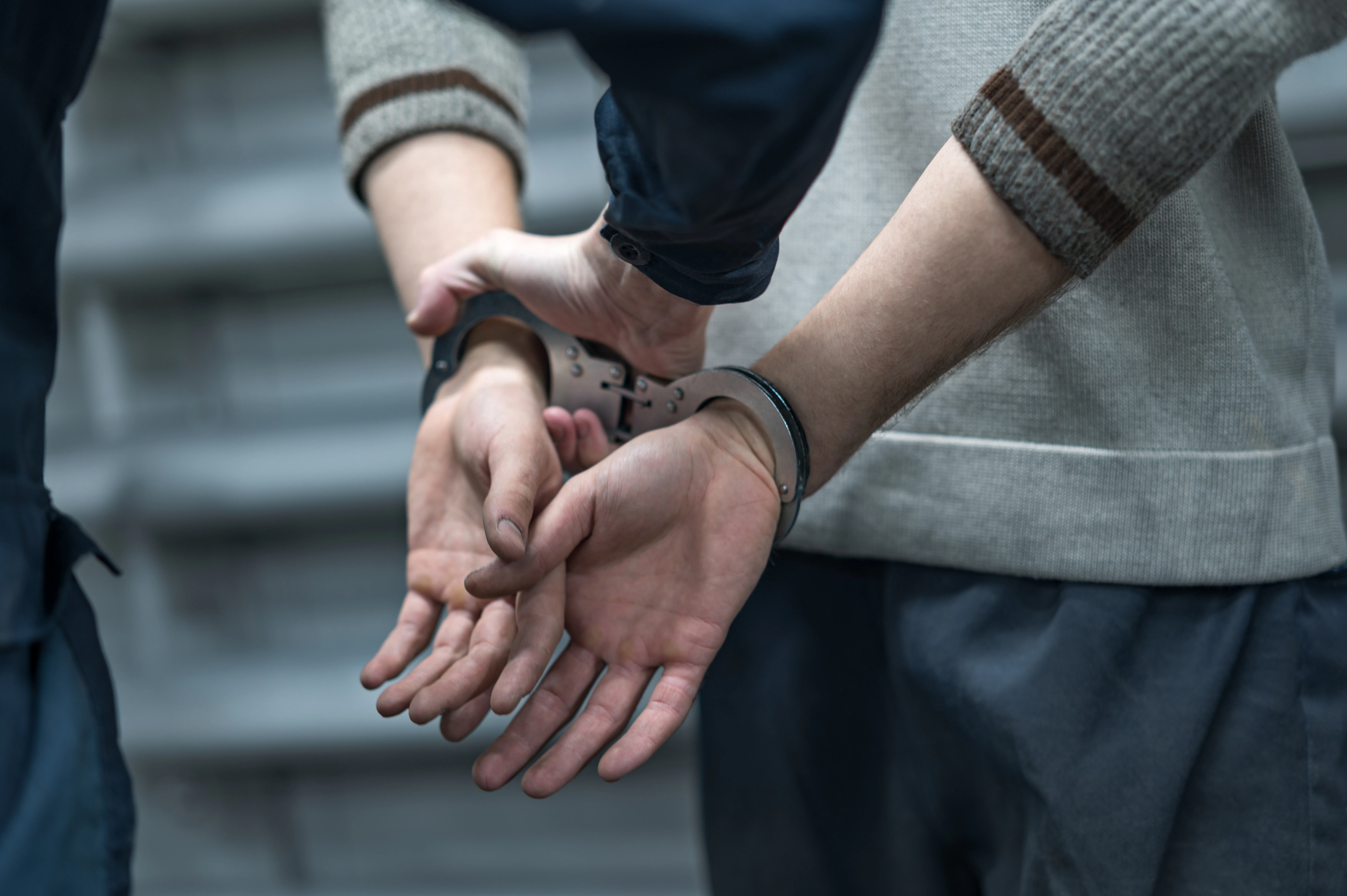hands in handcuffs