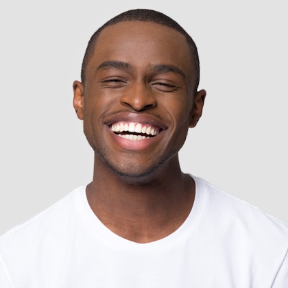 Man with very white teeth smiling