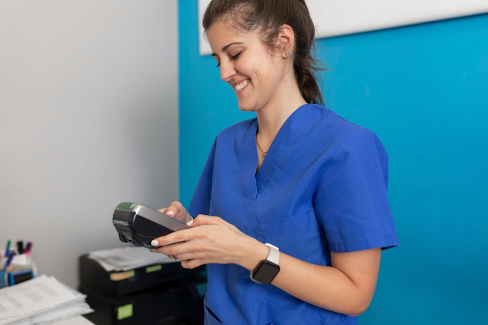 dental team member with card reader