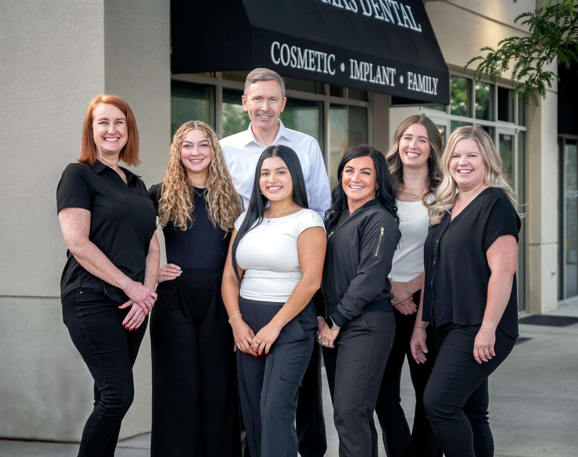 Dr. Allan S. Thomas and staff