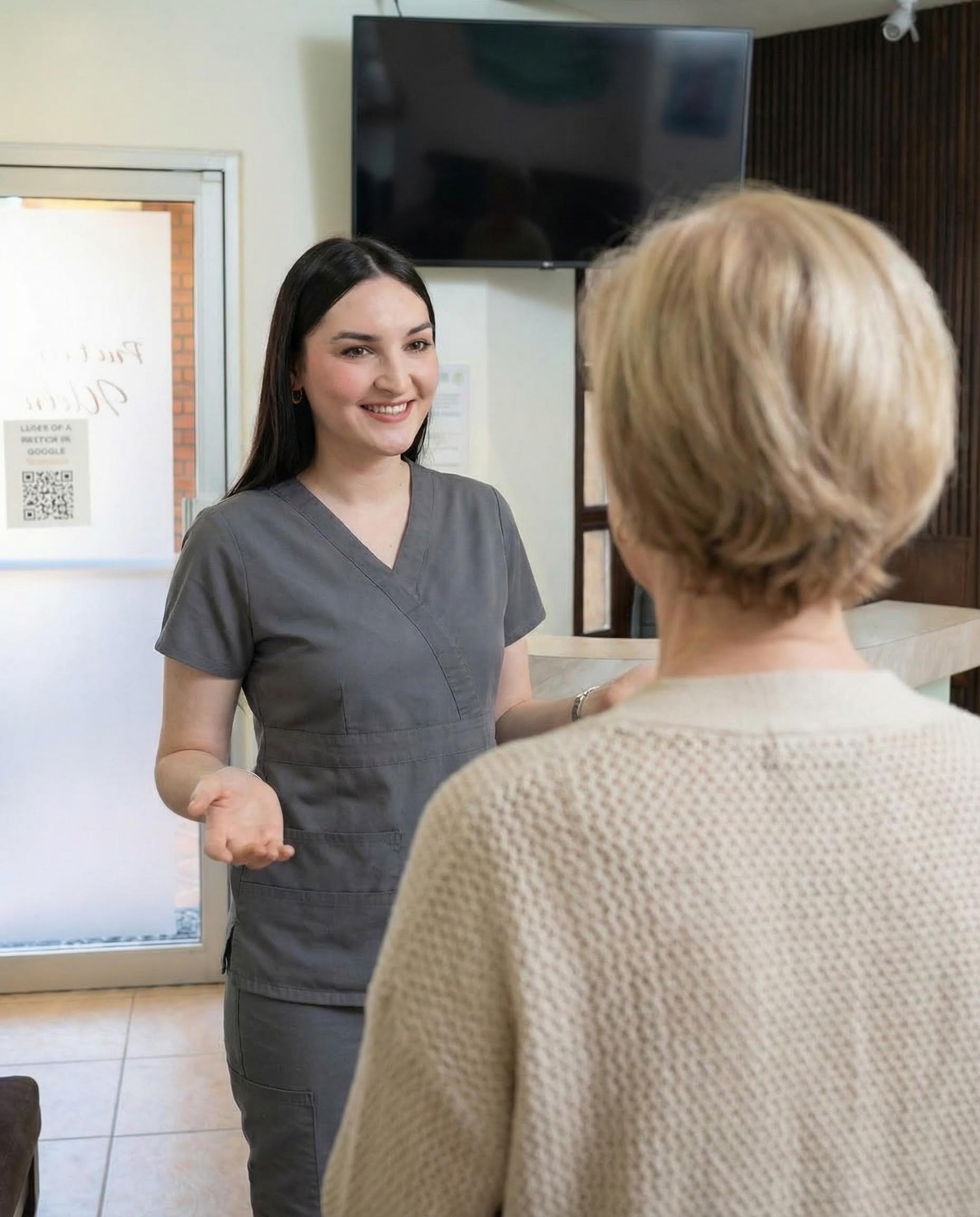 Dr. Lopez with a patient
