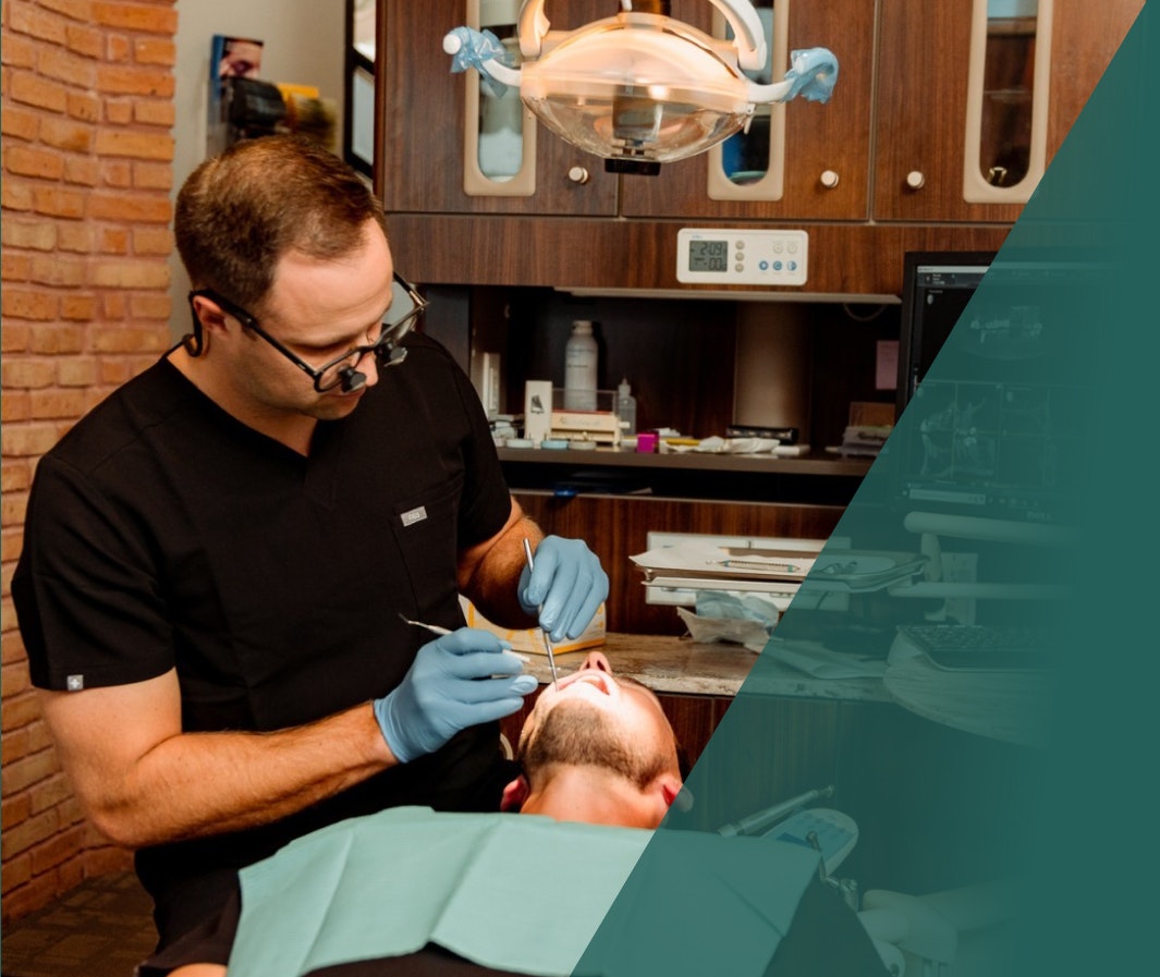 Dr. Garrett Hall working with a patient