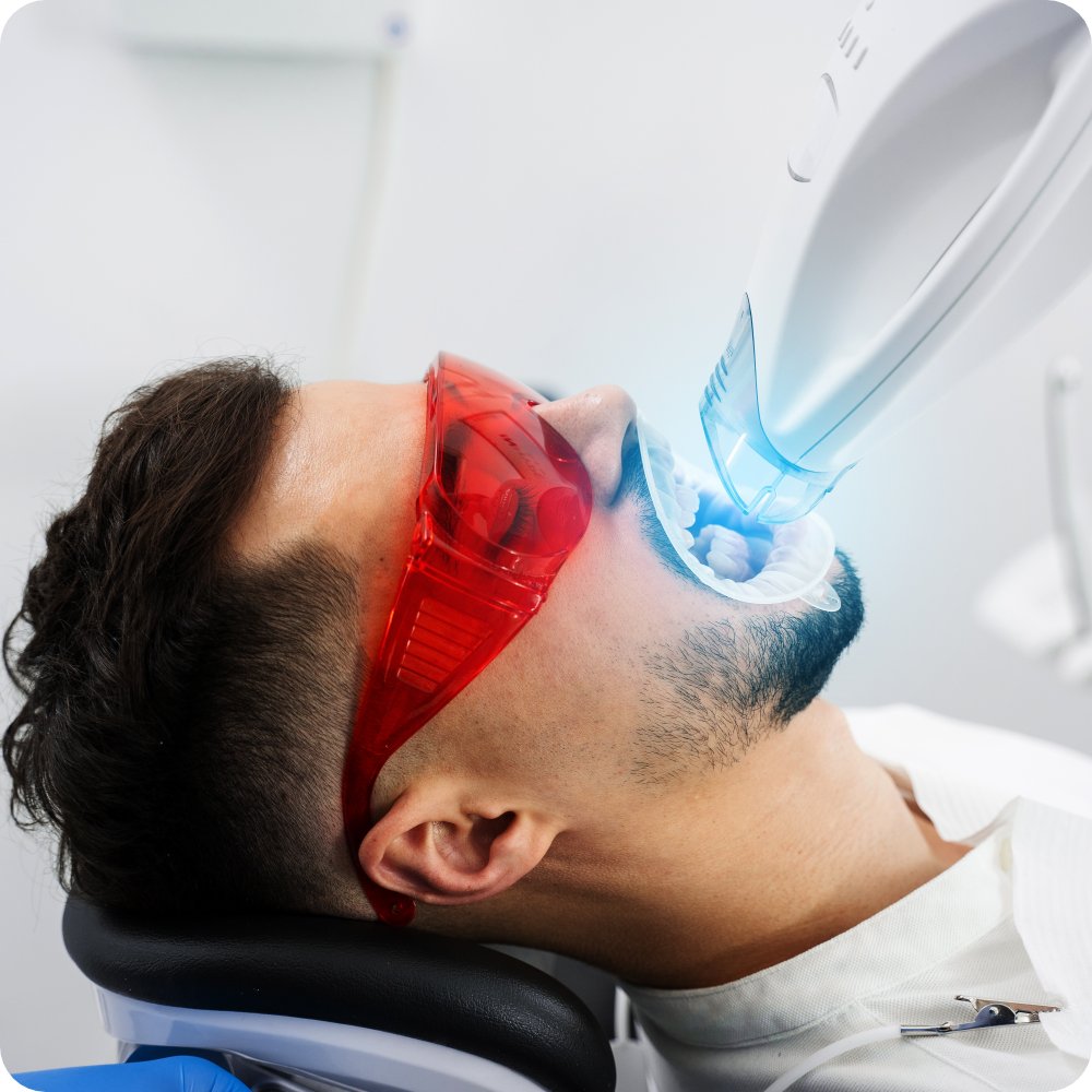 man undergoing teeth whitening
