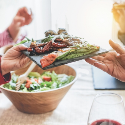 People sharing food during a meal