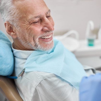 Smiling man during a dental check-up