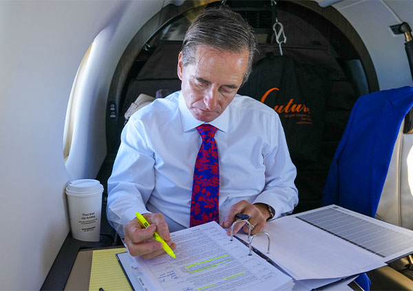 Attorney Christopher Dolan working on legal paperwork